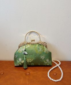 Handcrafted tassel embroidered handbag